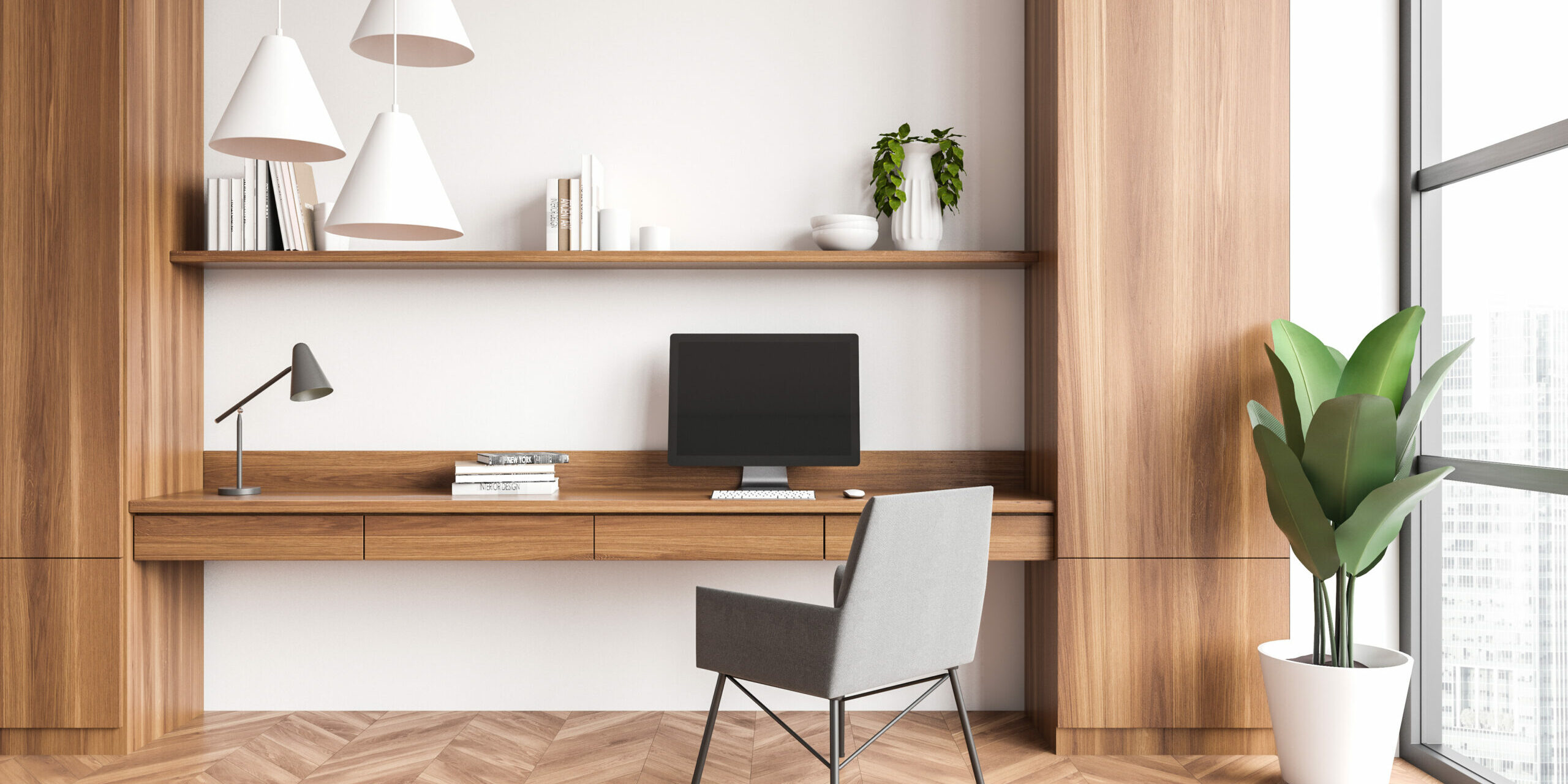 Front view on bright office room interior with computer